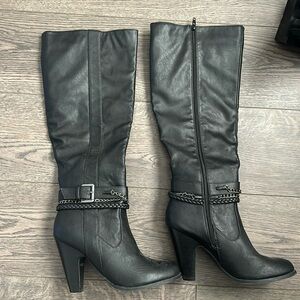 Tall black boots